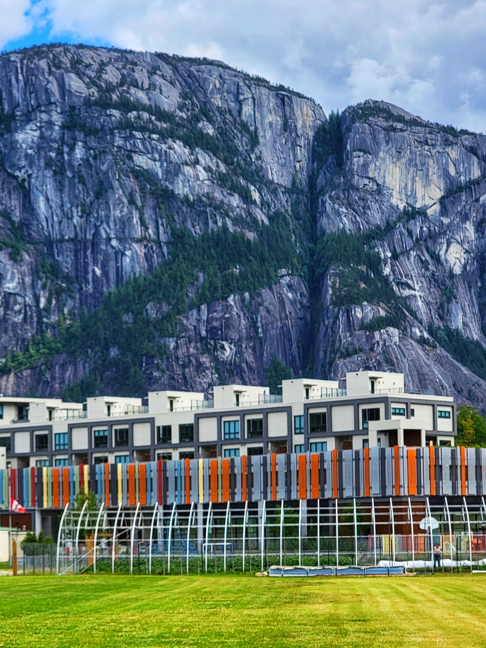 Jumar facade panel details with mountain background
