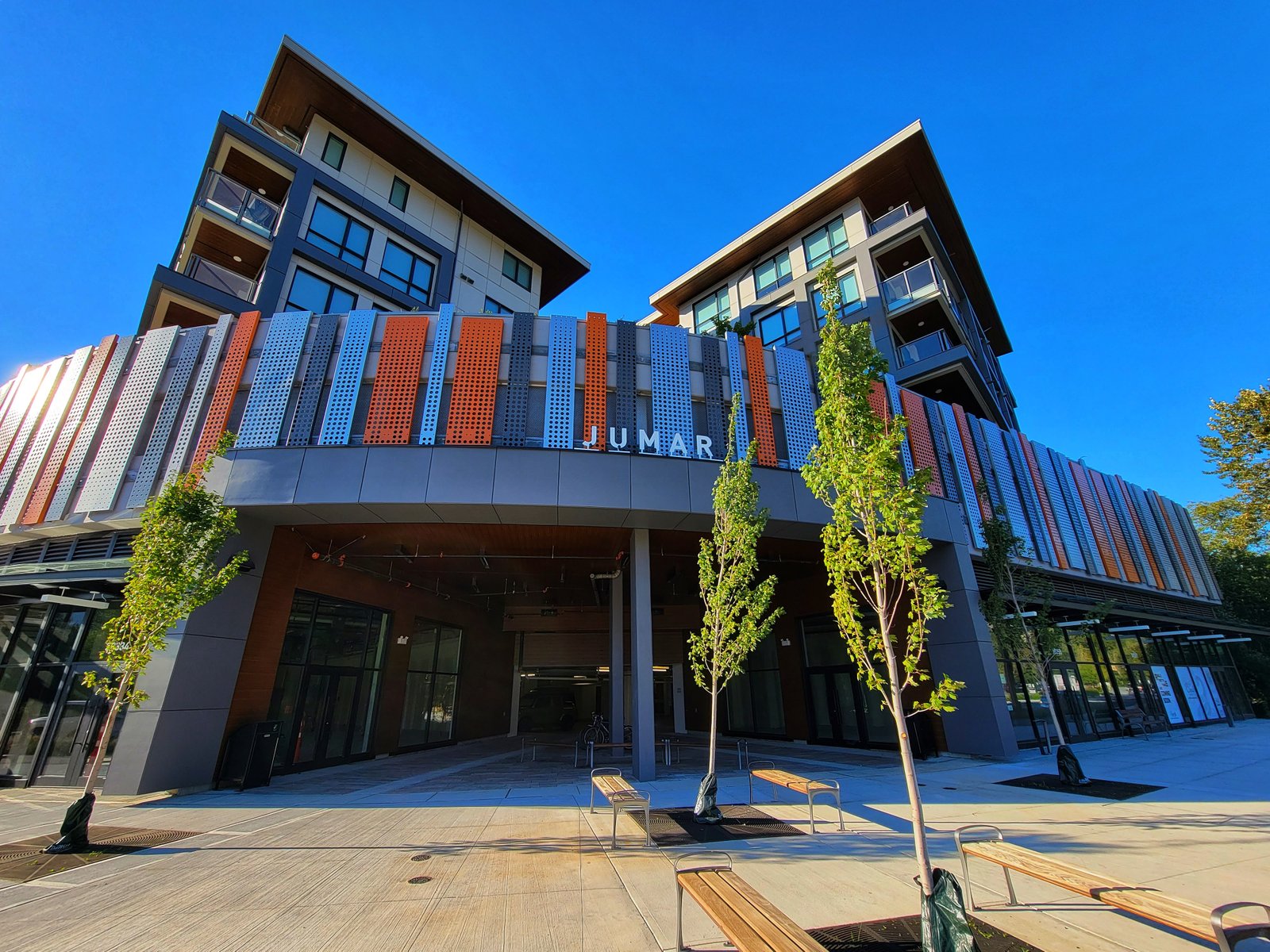 Canterior perforated aluminum panel system on a building facade at golden hour