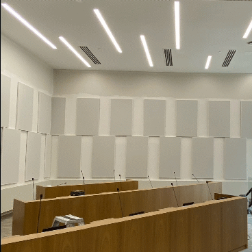 Wide view of institutional acoustic wall panels in a council chamber